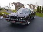 Front shot of a 1983 Black Hurst/Olds