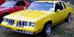 Yellow 1984 Cutlass lowrider.