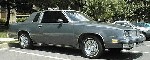 Nice greenish gray Cutlass with tinted windows