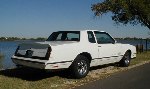 Rear side shot of white Chevy Monte Carlo SS