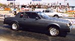 Charcoal gray 1986 Buick T-Type at the drag strip