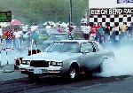 Light gray 1987 Buick Turbo T getting ready to launch